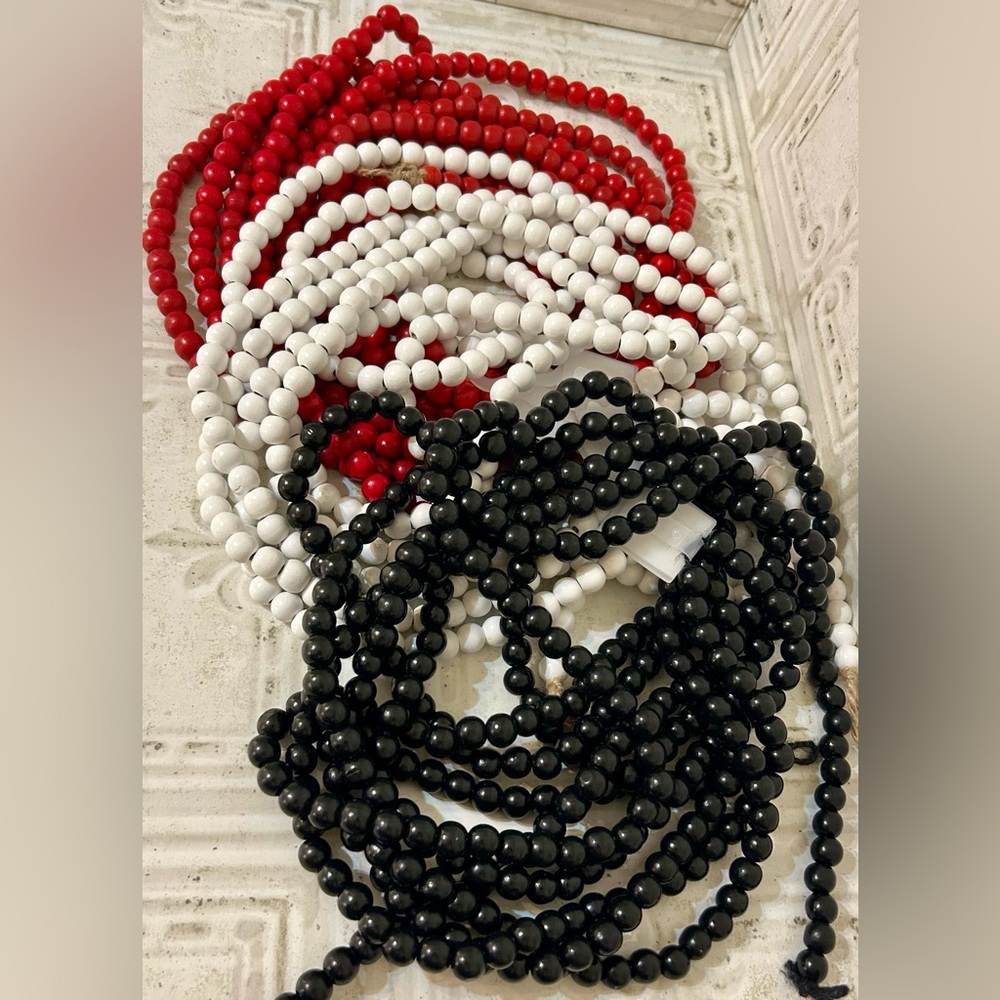 Wood Bead Garland Stands  -approx 9’ ea - 2 RED 2 WHITE & 2 BLACK

Set of 6 $20